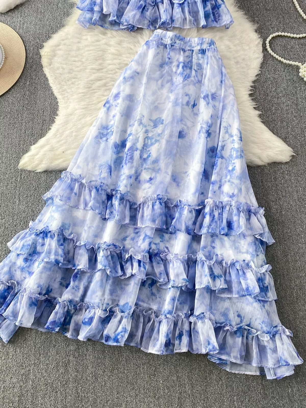 Floral blouse ruffle hem detail