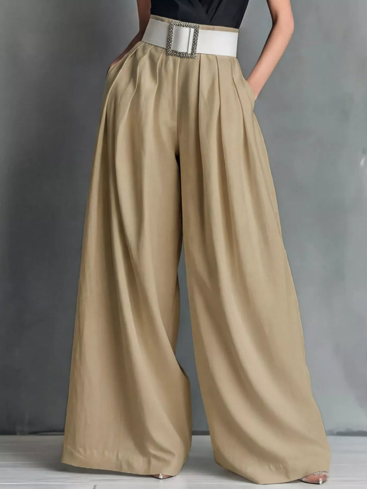 High waisted wide leg trousers close up view
