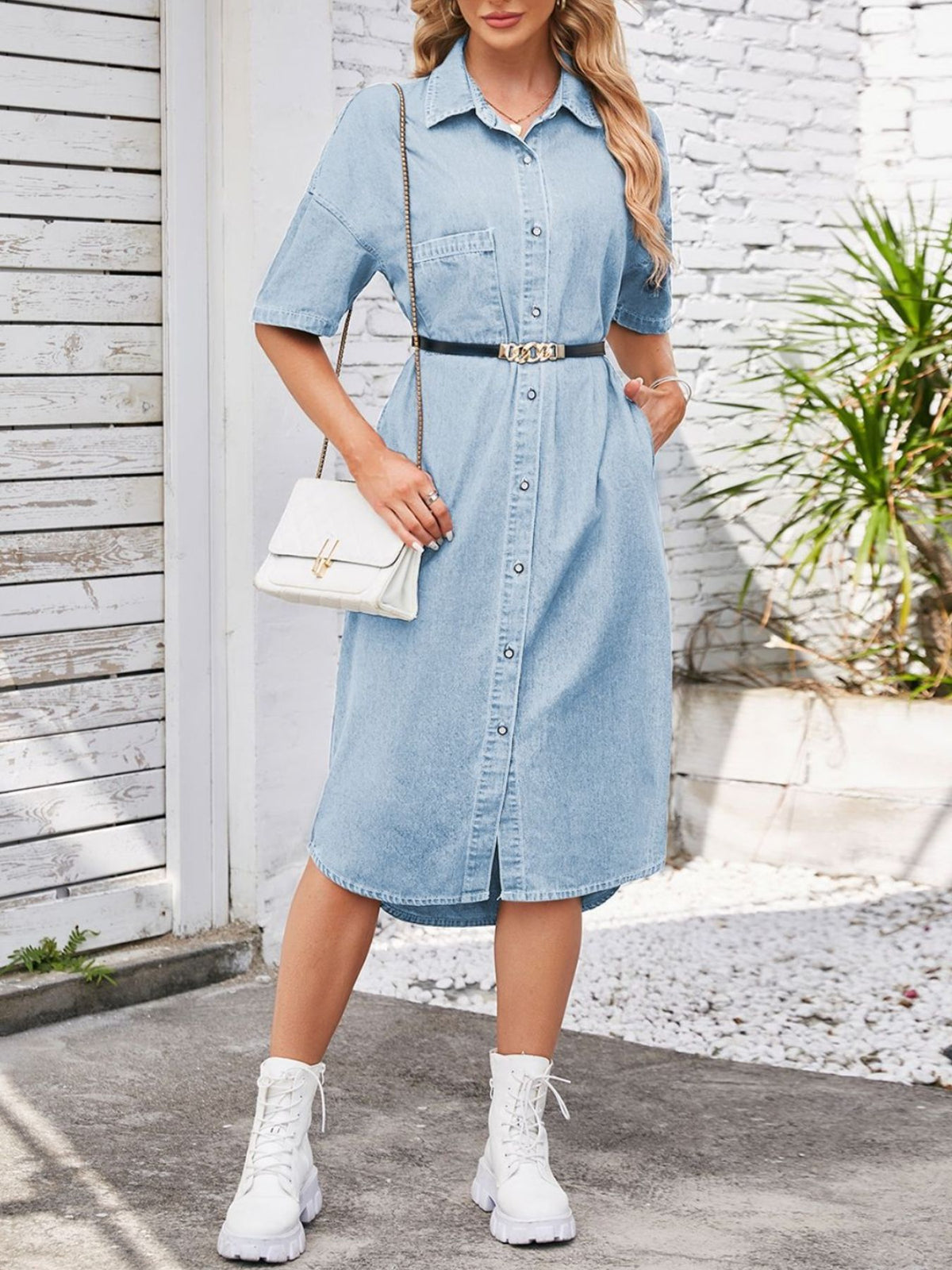 Half sleeve and shoulder view of the light blue dress