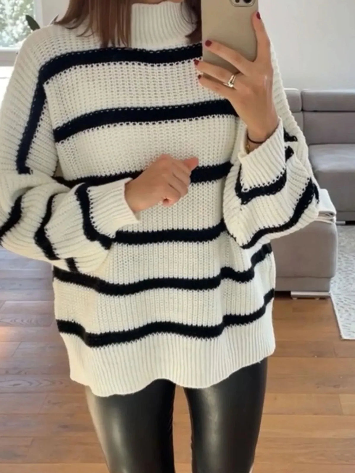 Striped turtleneck sleeve detail