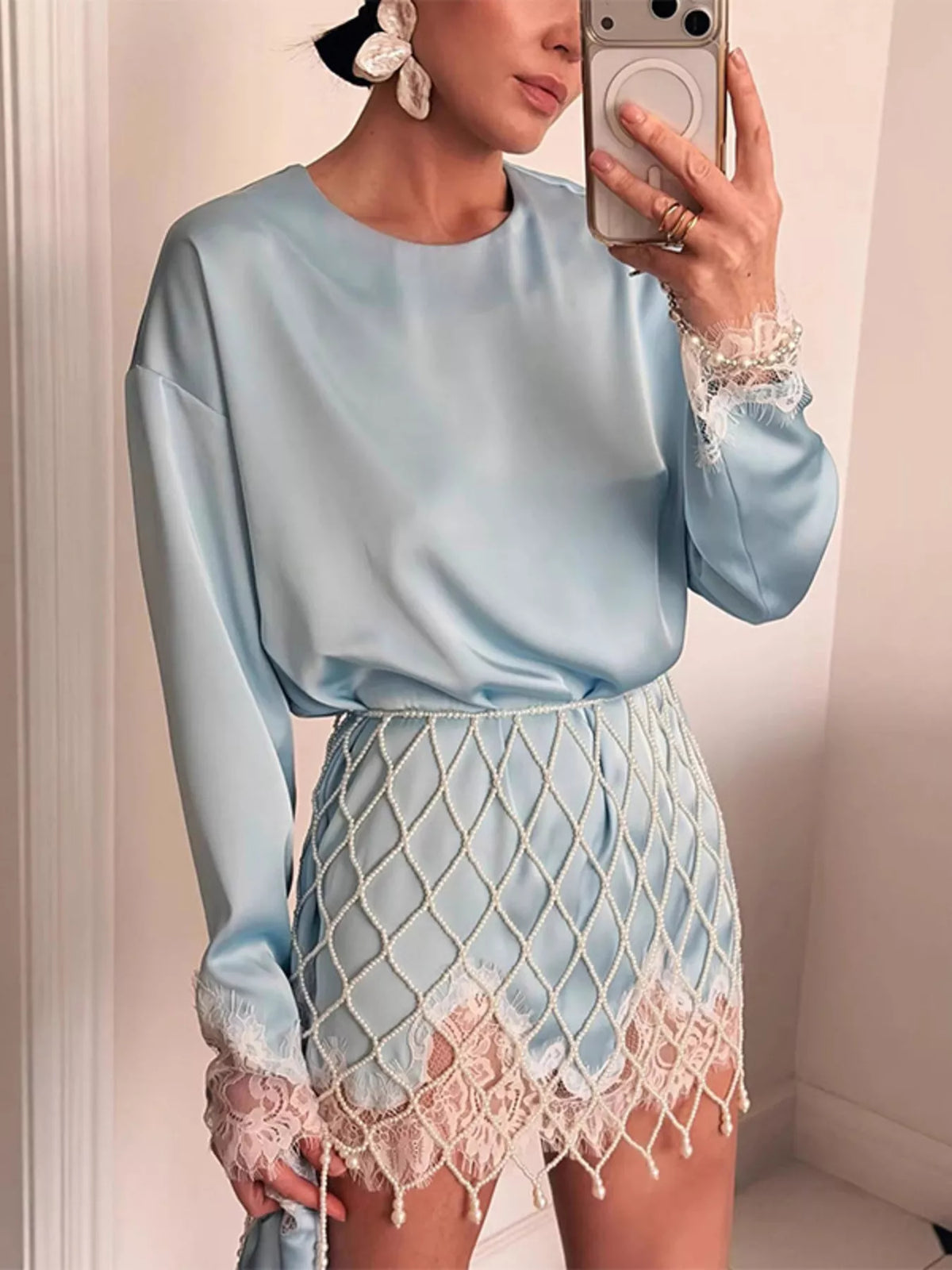 Light blue lace hem oversized satin top front view
