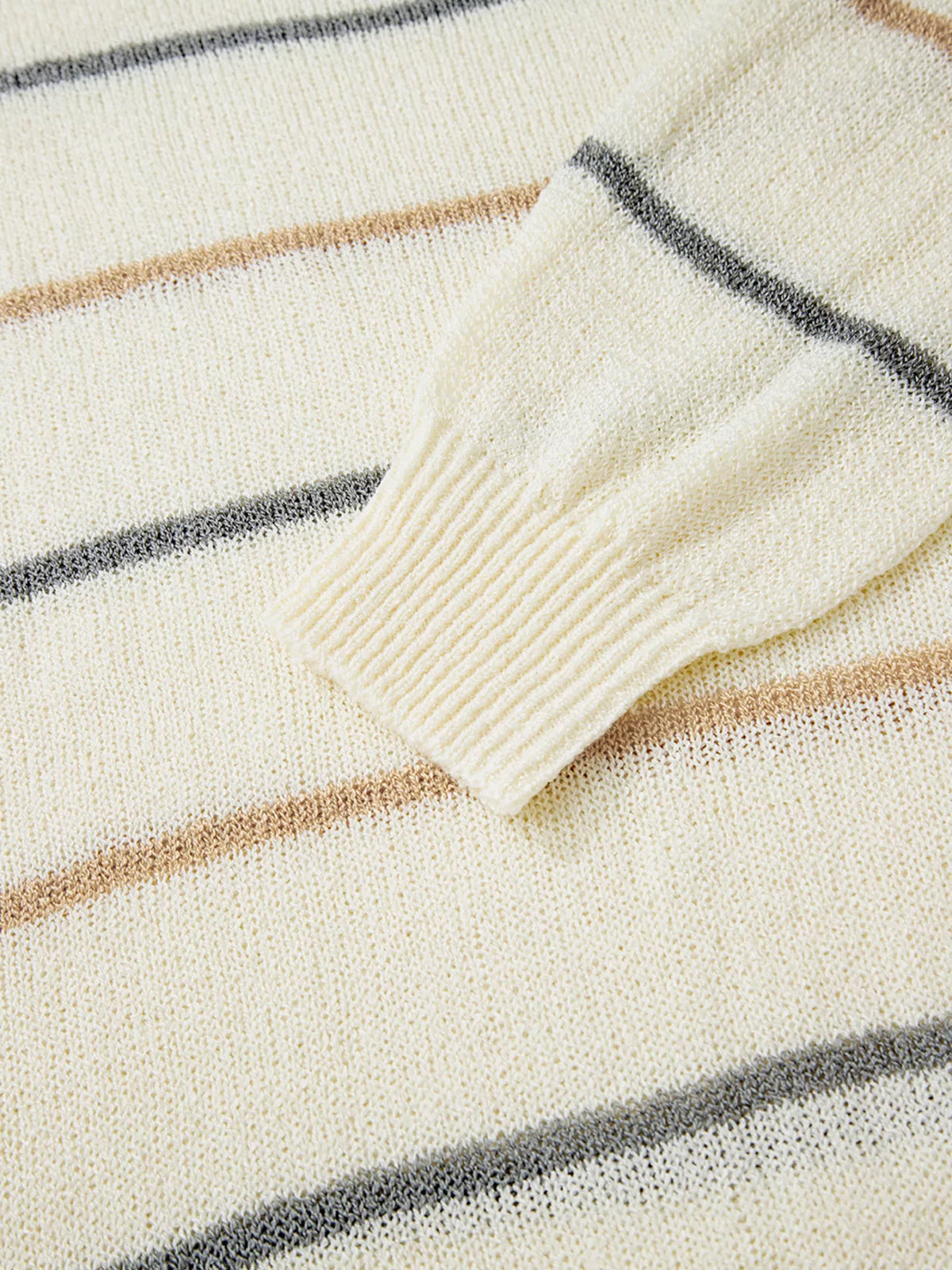 Striped ribbed drop shoulder sweater, styled with trousers
