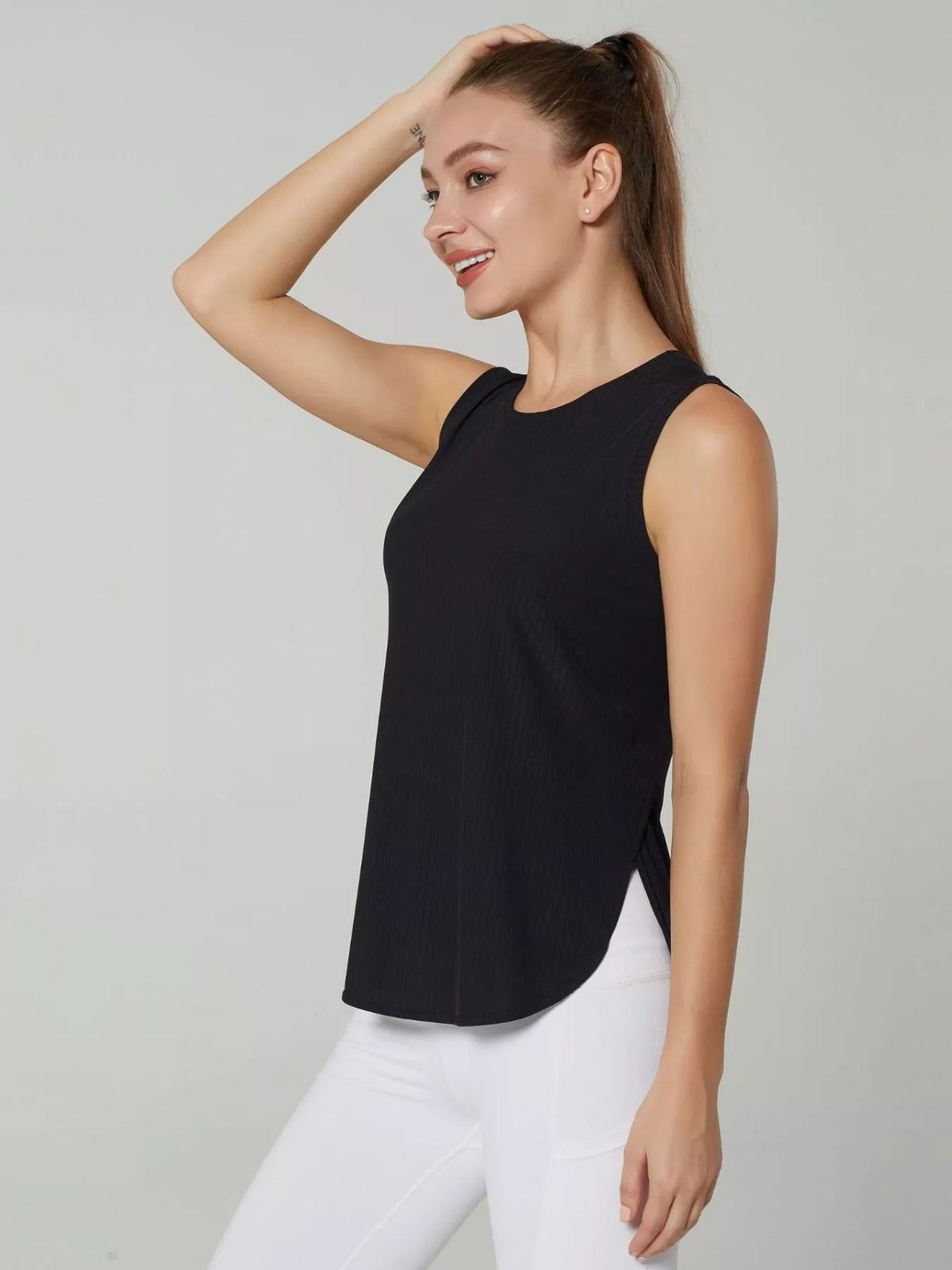 Detail of the tank neckline and shoulder strap