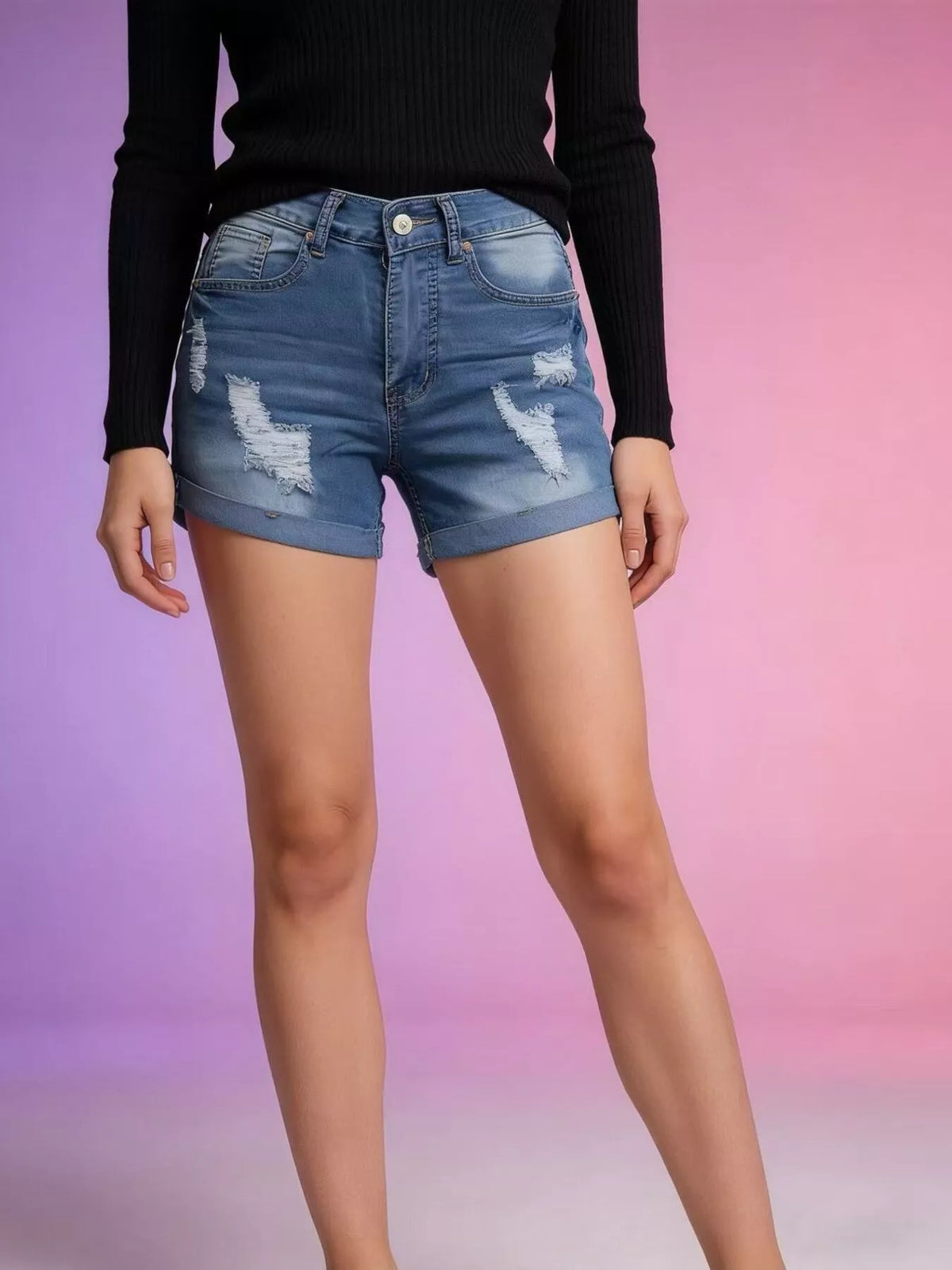 Distressed shorts shown in an alternate wash
