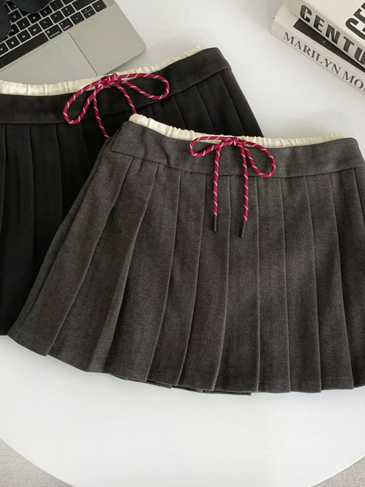Black pleated skirt back view