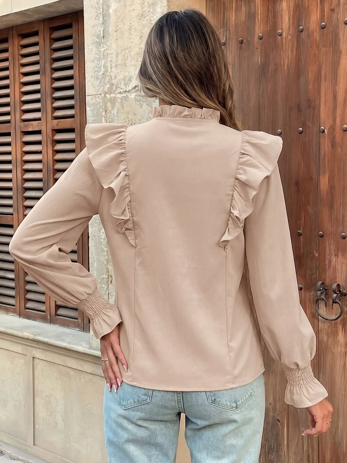 Taupe tie neck long sleeve blouse styling close up