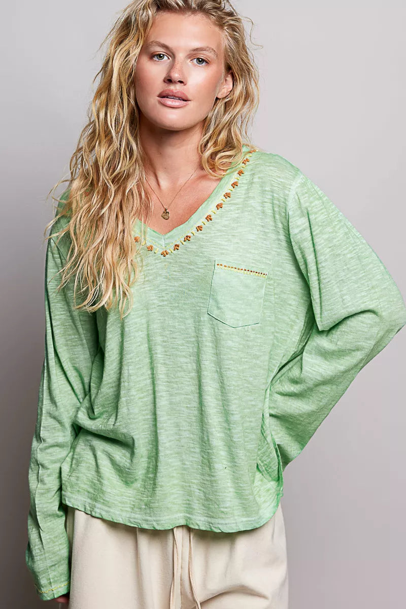 Green knit long sleeve top side view