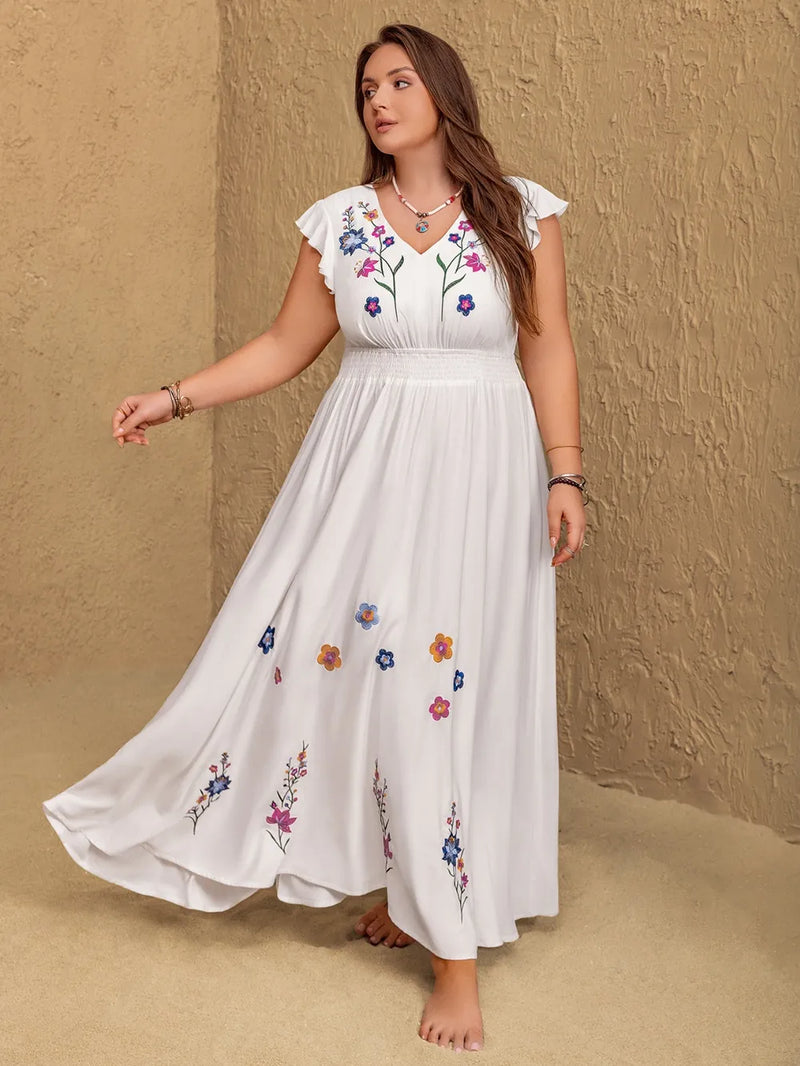 Plus size embroidered floral v neck maxi dress in white front view