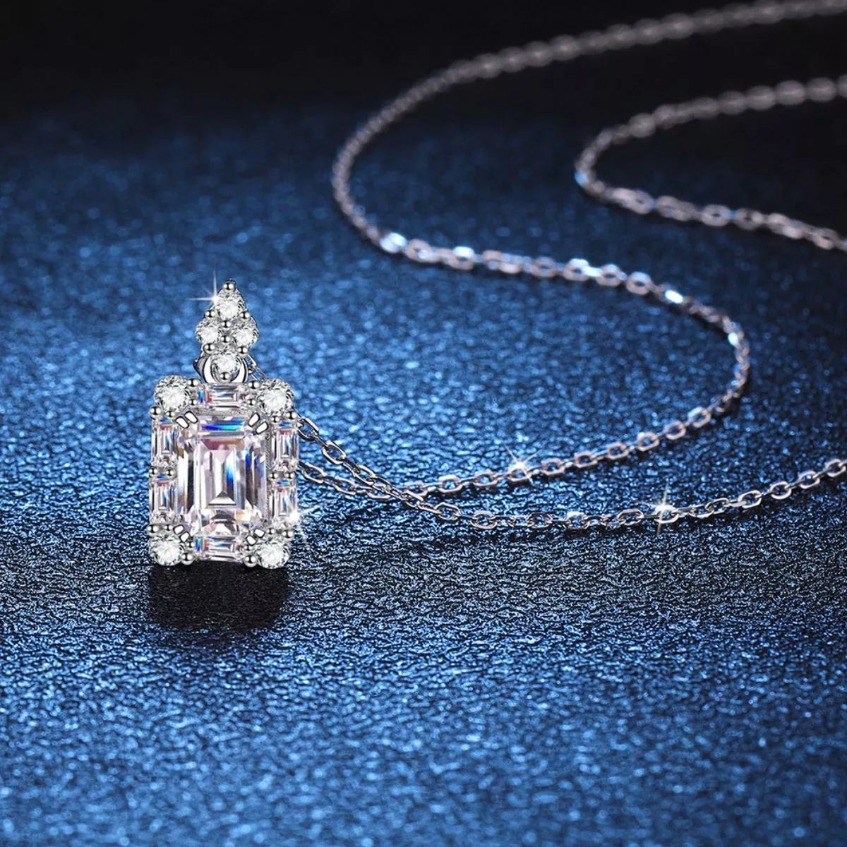 1 carat moissanite halo pendant with a fine silver chain