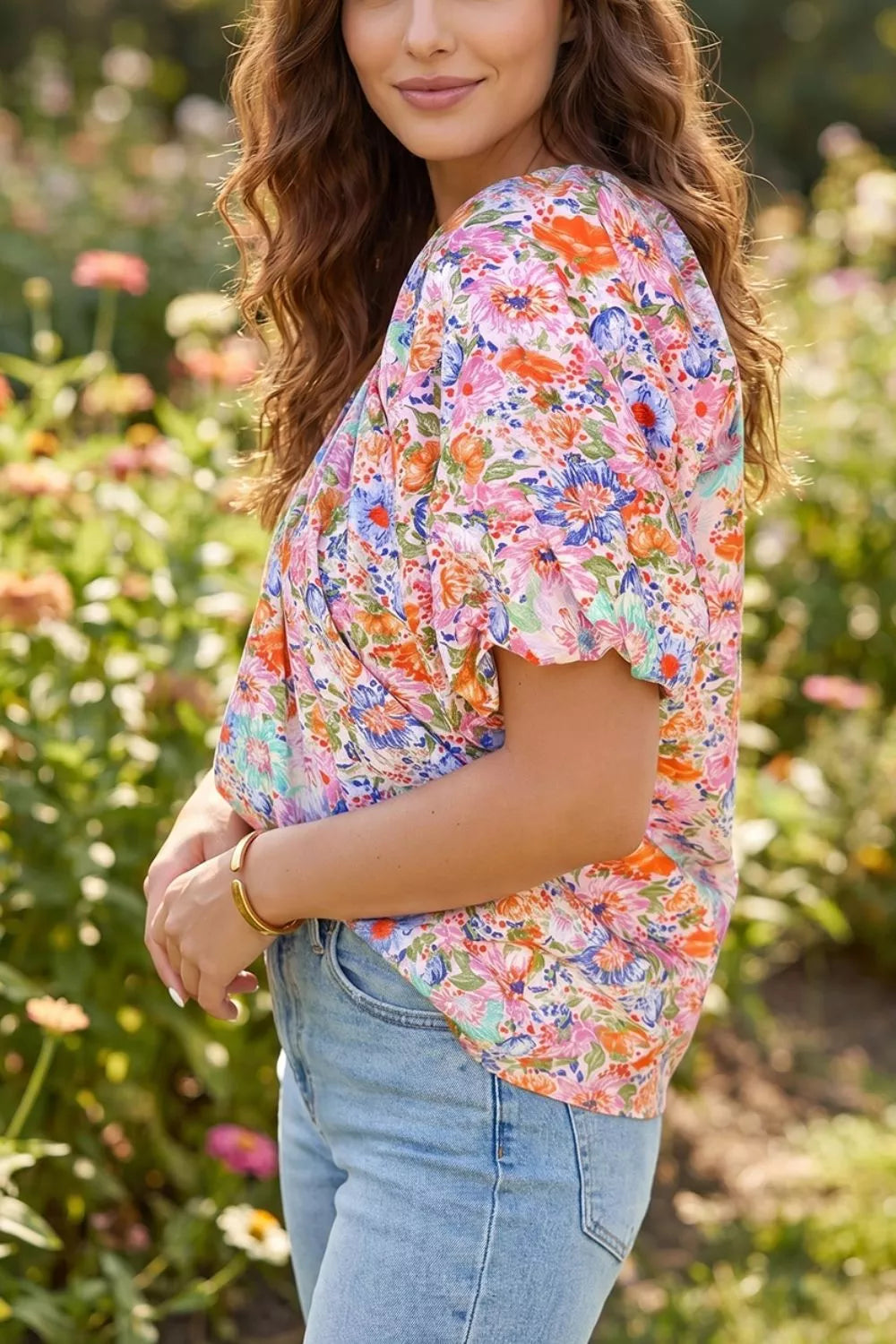 Close up of floral print fabric on womens blouse