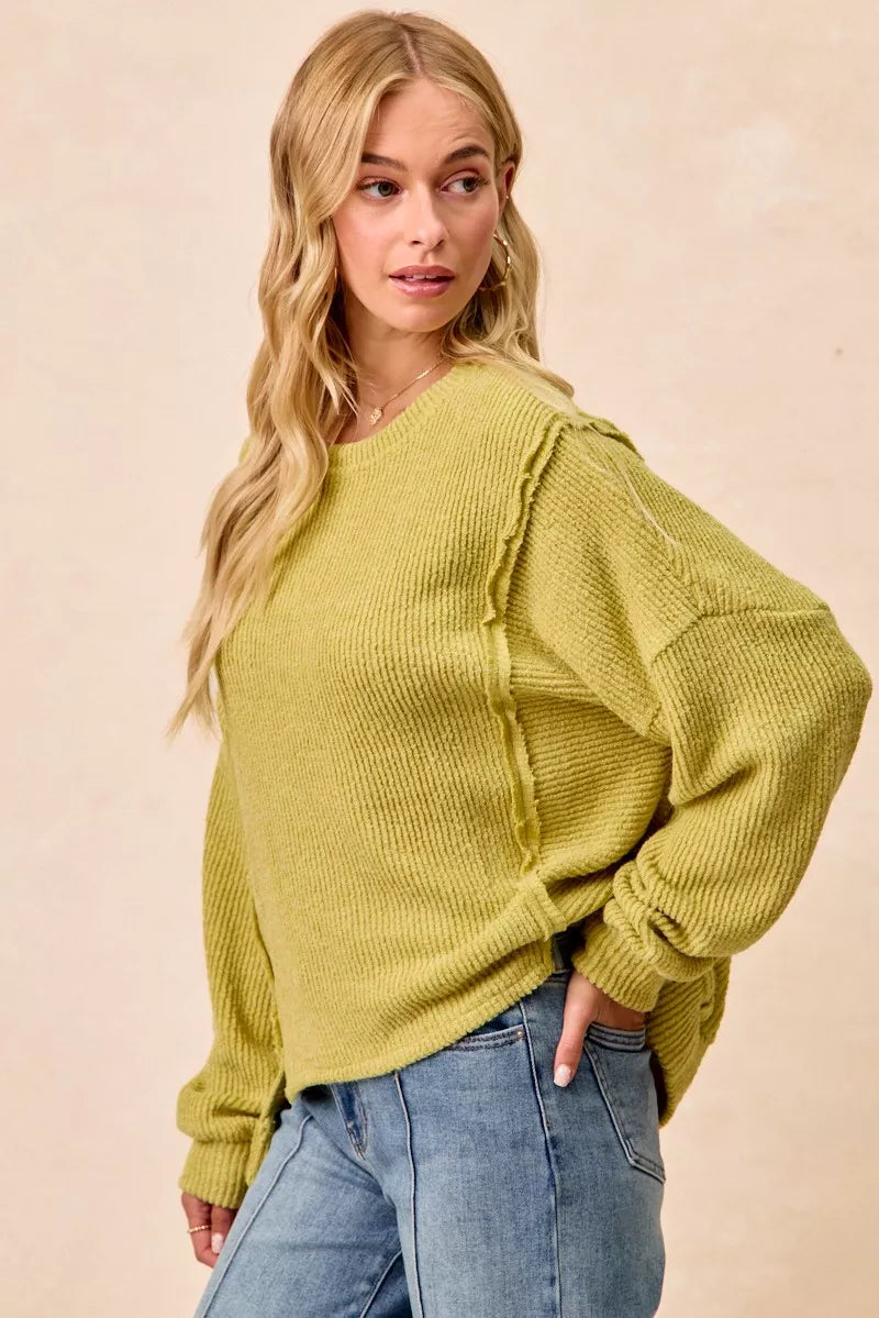 Lime green rib knit sweater open seam detail
