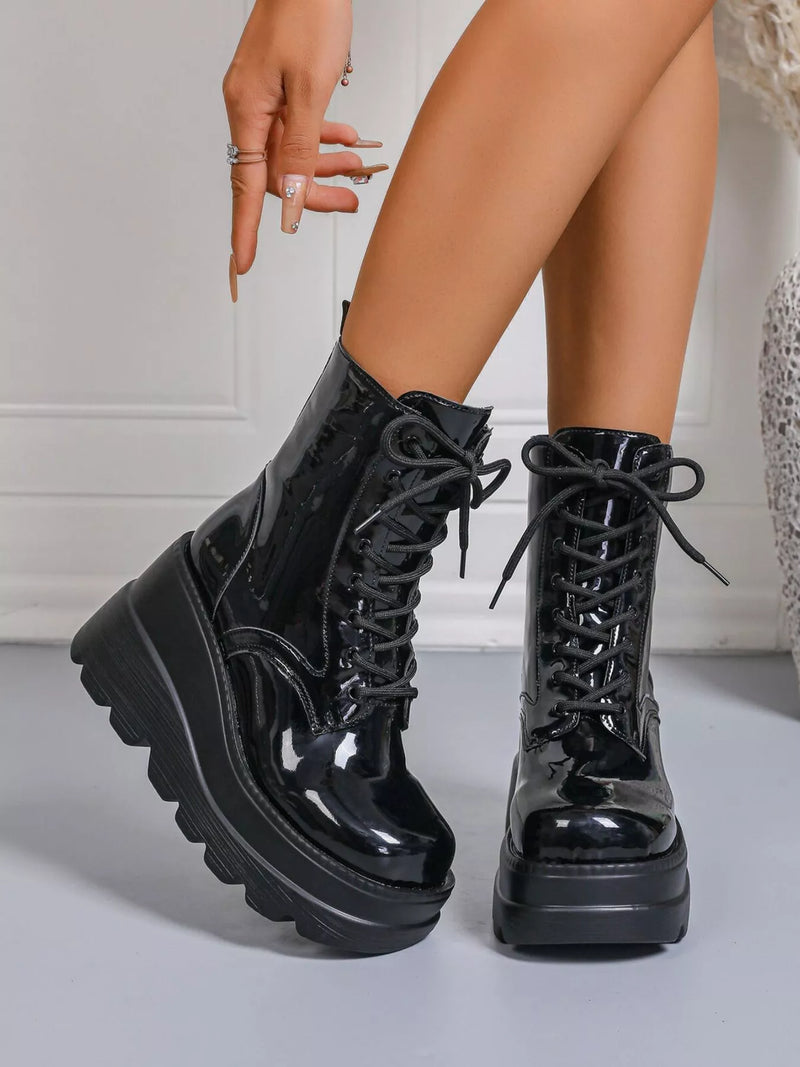 Black lace up wedge platform boots side profile view