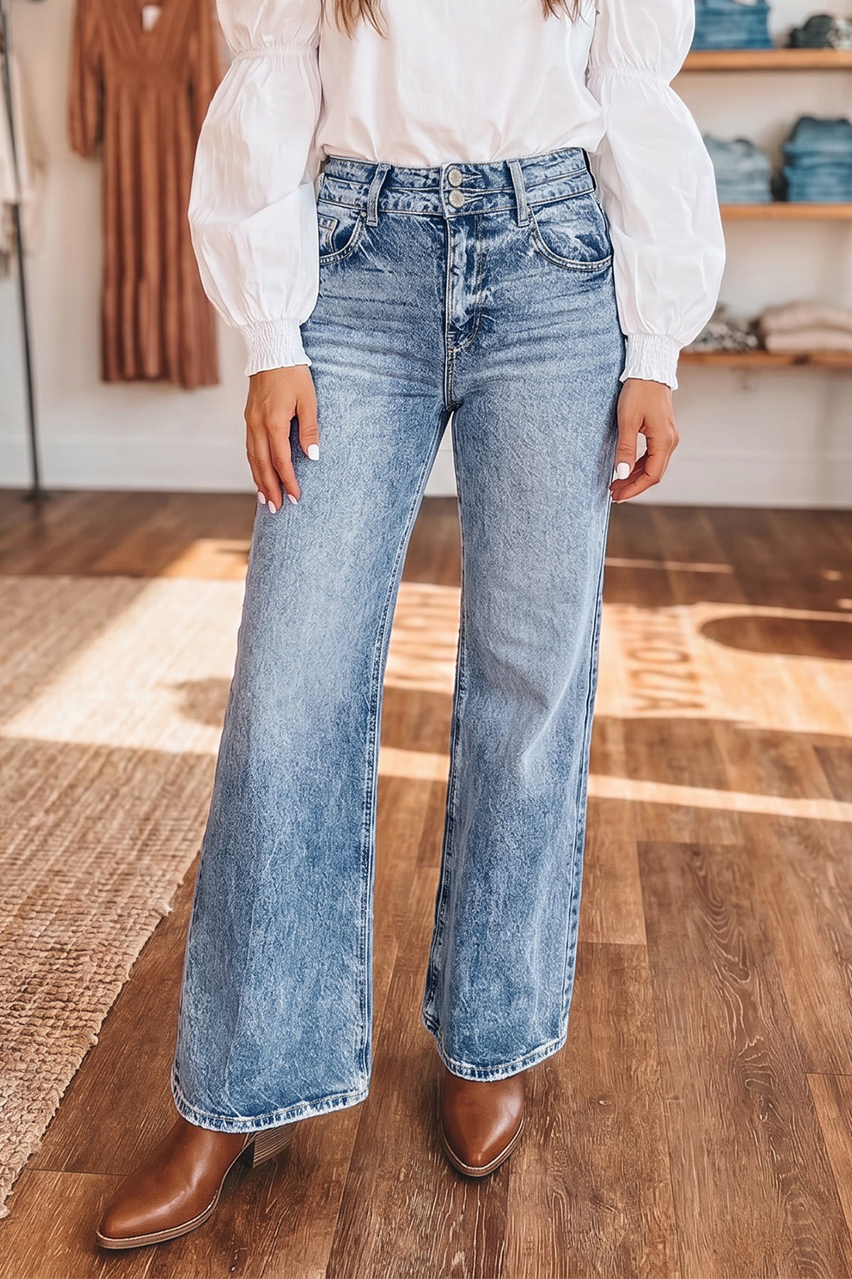 Blue acid wash flare jeans front view with high waist and five pockets