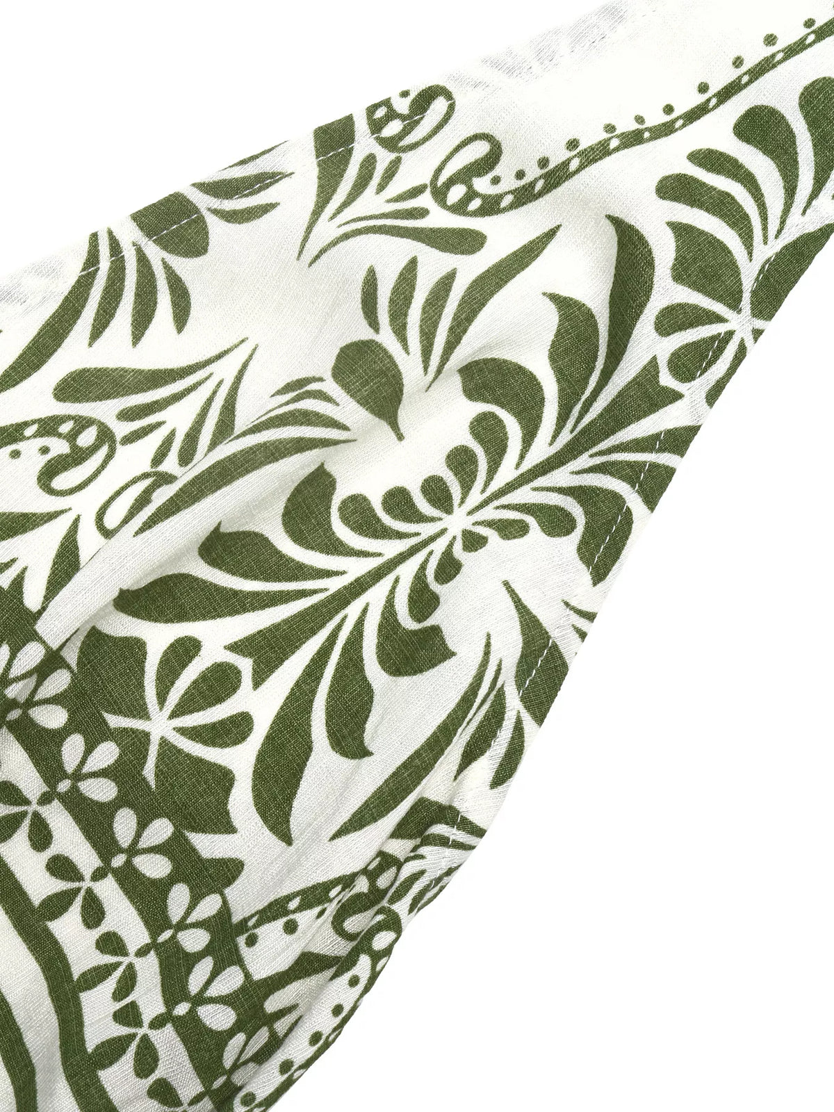 Green printed halter neck wide leg jumpsuit, fabric texture detail