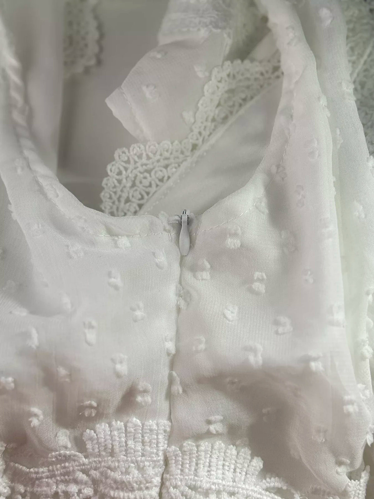 white swiss dot lace sleeveless tied maxi dress styled outfit view