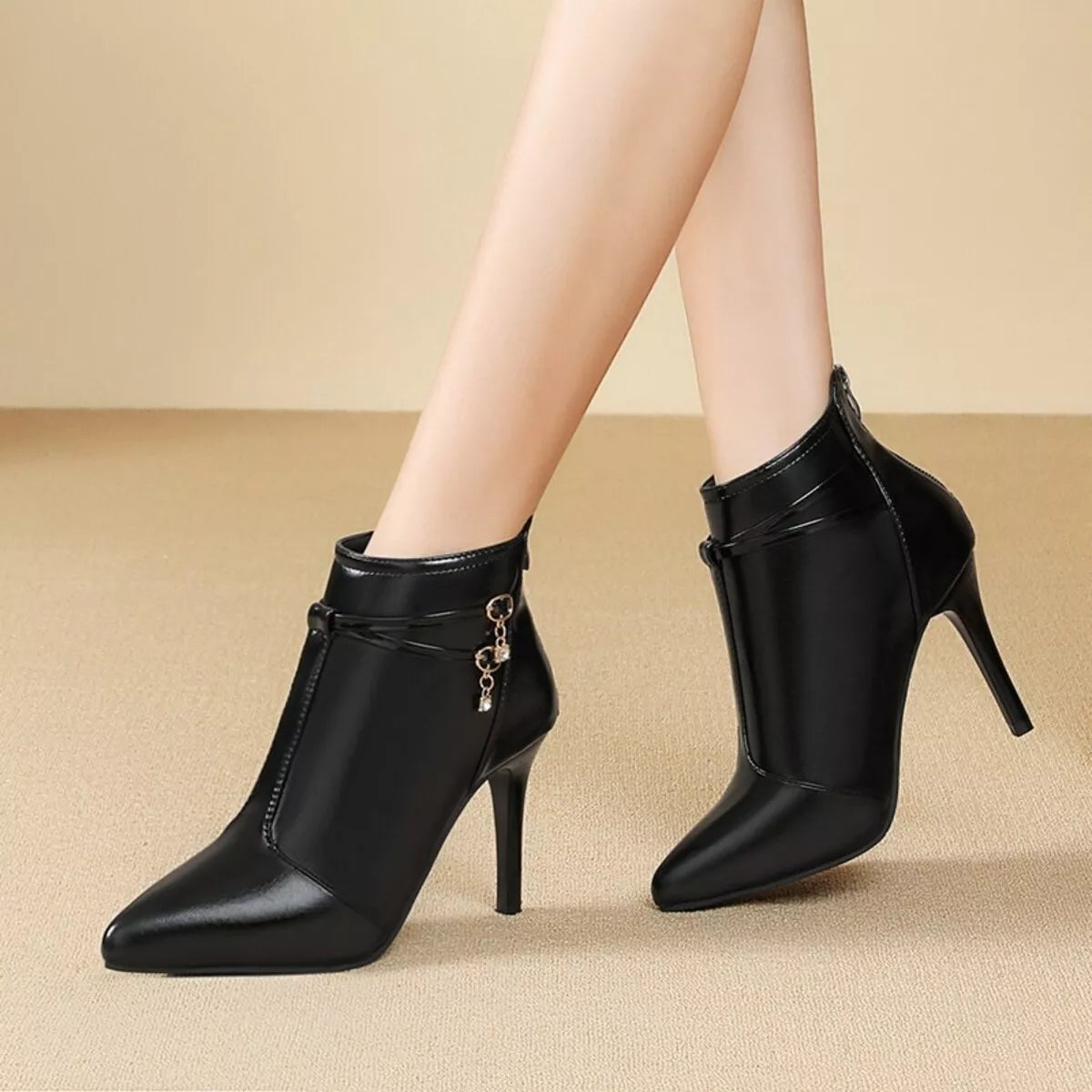 Point toe stiletto ankle boots front view