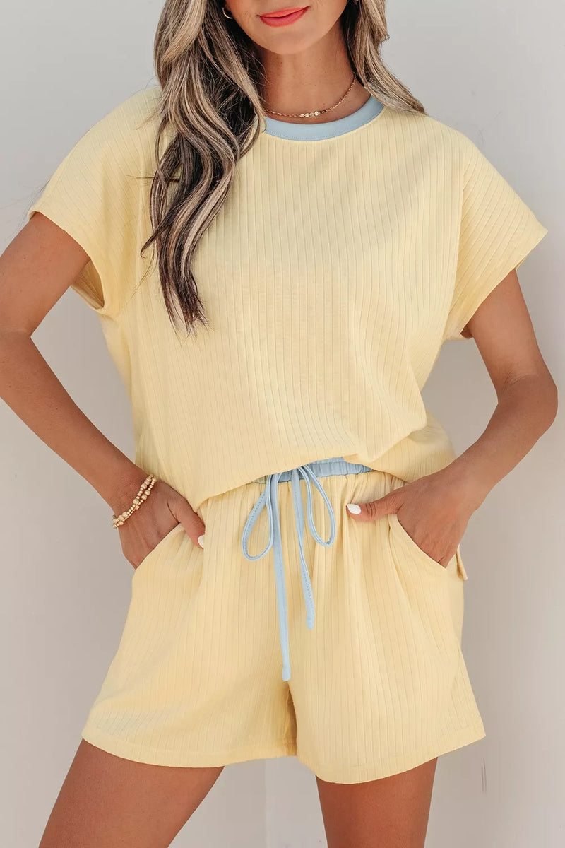 Pastel yellow ribbed color block top and shorts two piece set front view