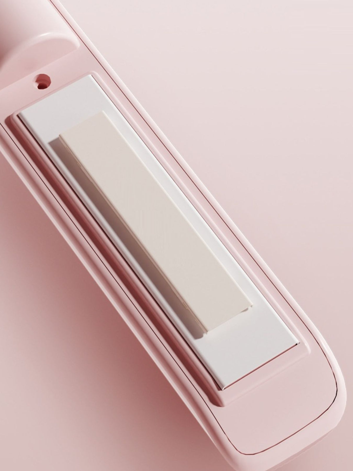 Portable straightener in hand