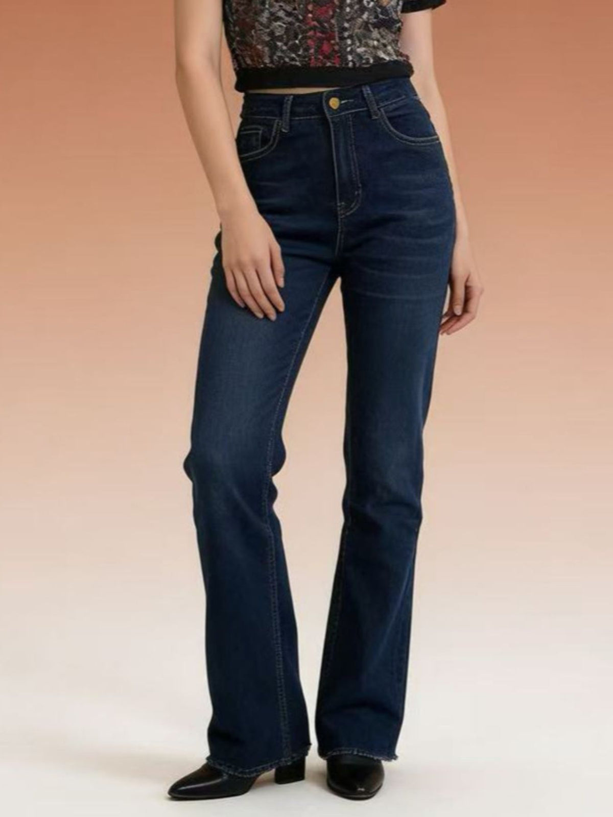 Back view of high waisted bootcut denim