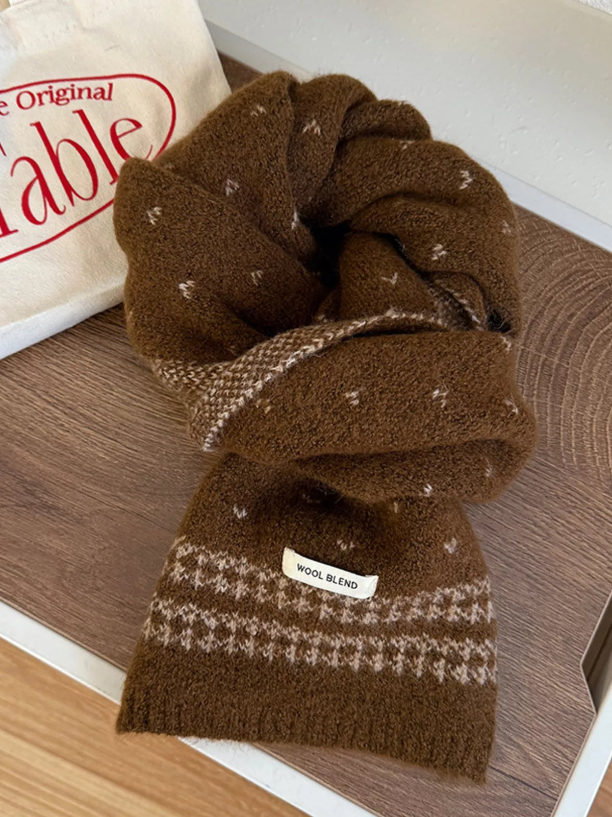 Detail of the ribbed knit finish on the winter scarf