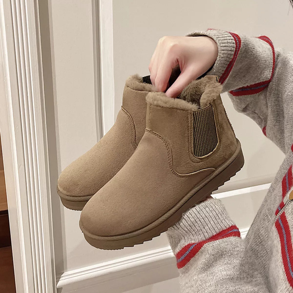Round toe platform boots standing pose