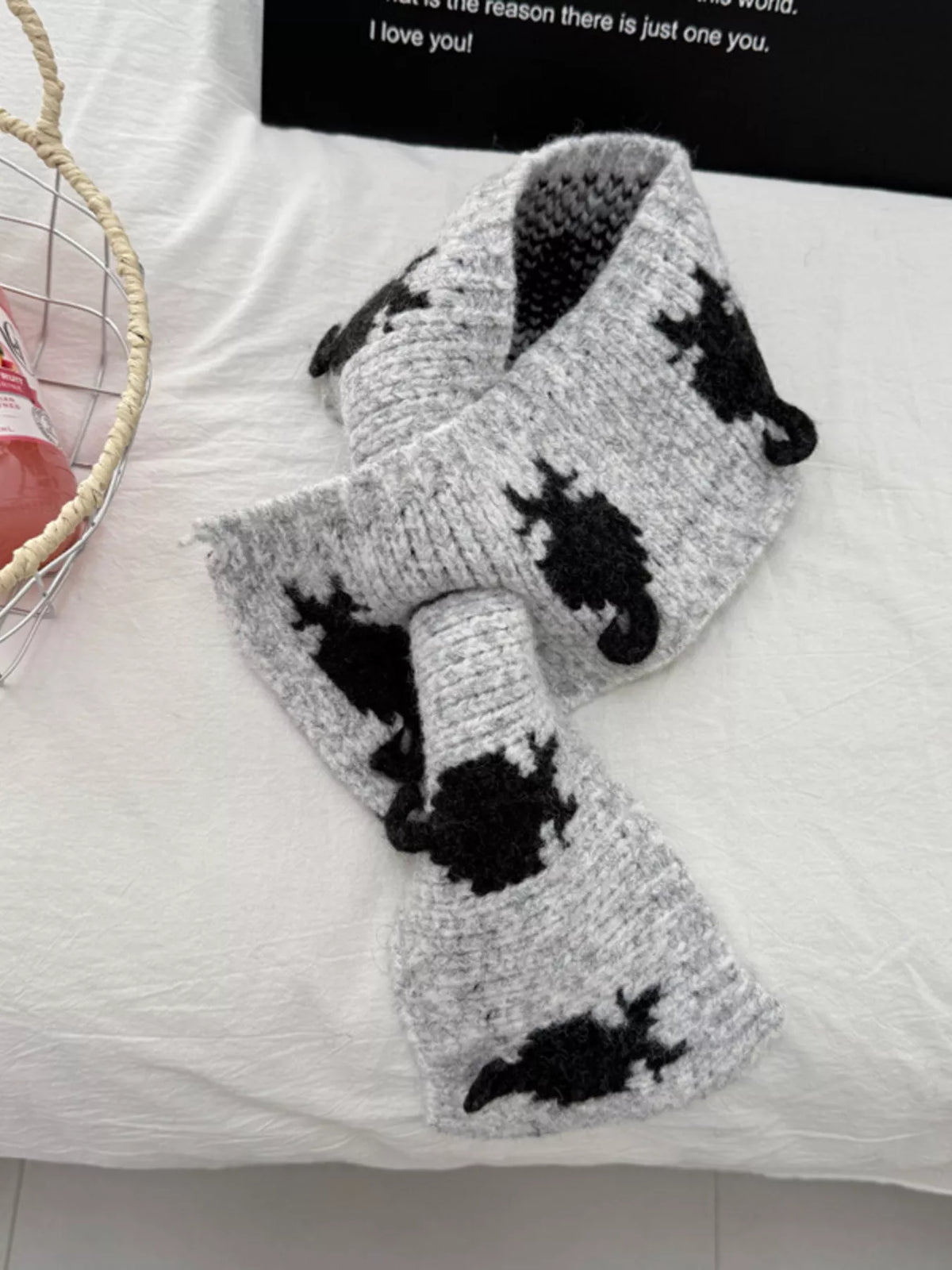 Light gray patterned knit scarf