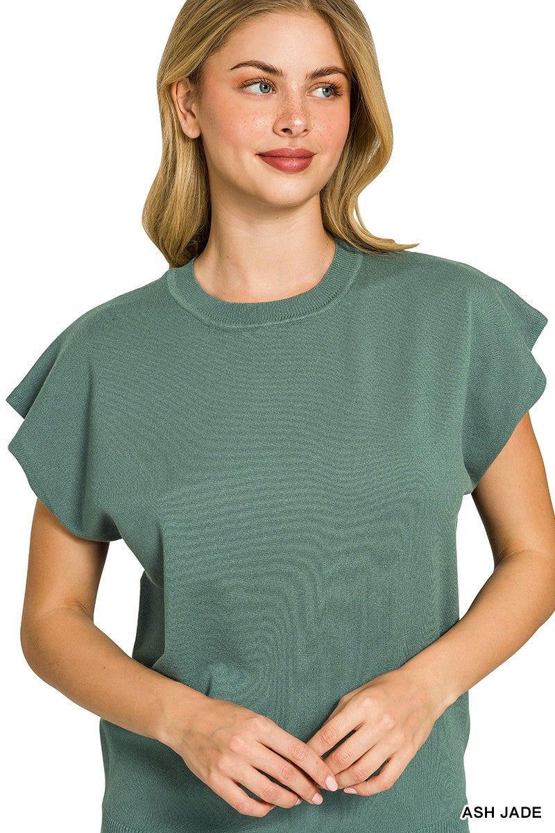 Ribbed texture of green short sleeve sweater
