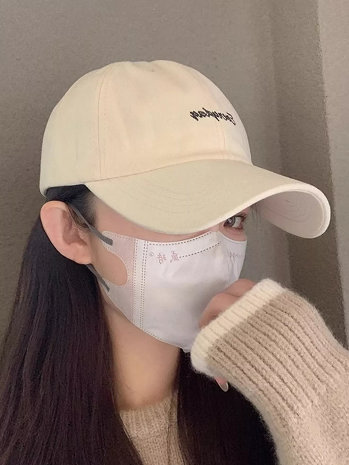 Embroidery detail on cotton baseball cap