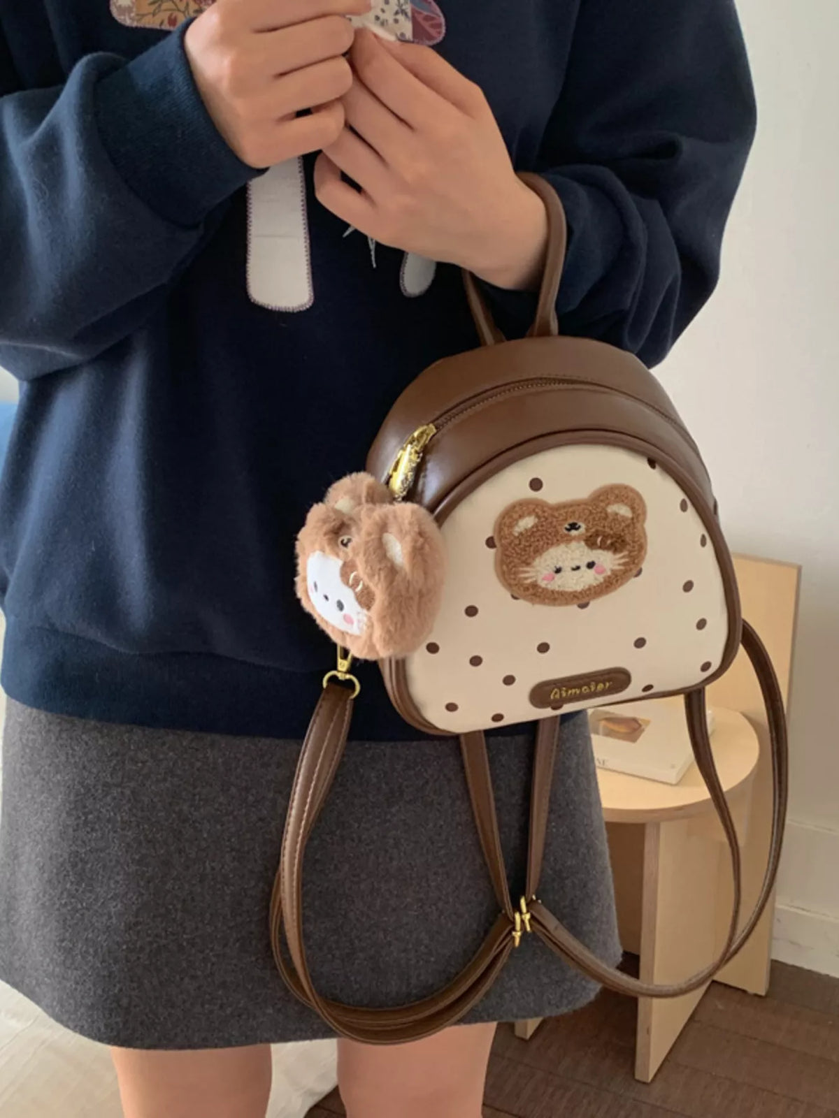 Brown cartoon bear mini backpack worn on the back