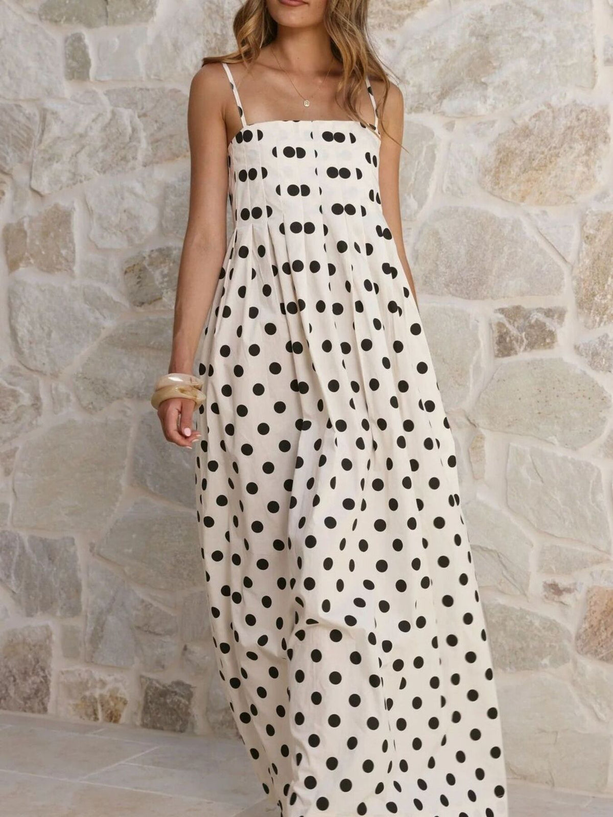 Polka dot smocked pleated maxi dress hem detail