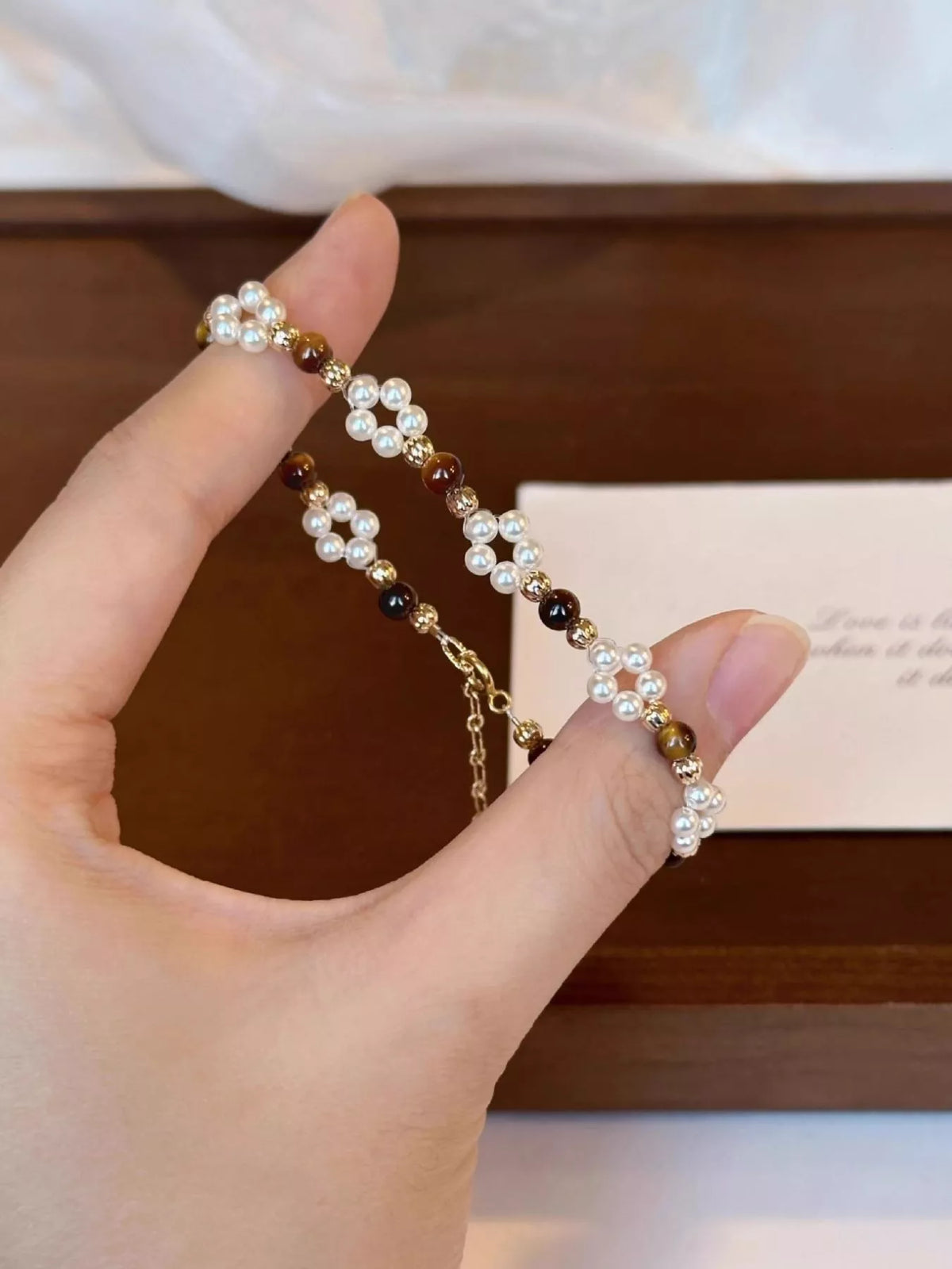 Pearl and tiger eye beaded bracelet bead detail