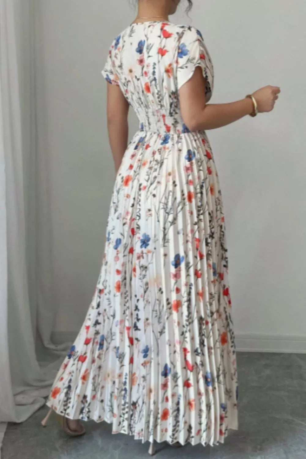 Floral pleated maxi dress side view