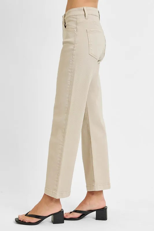 Close up of tummy control mid rise waistband on jeans