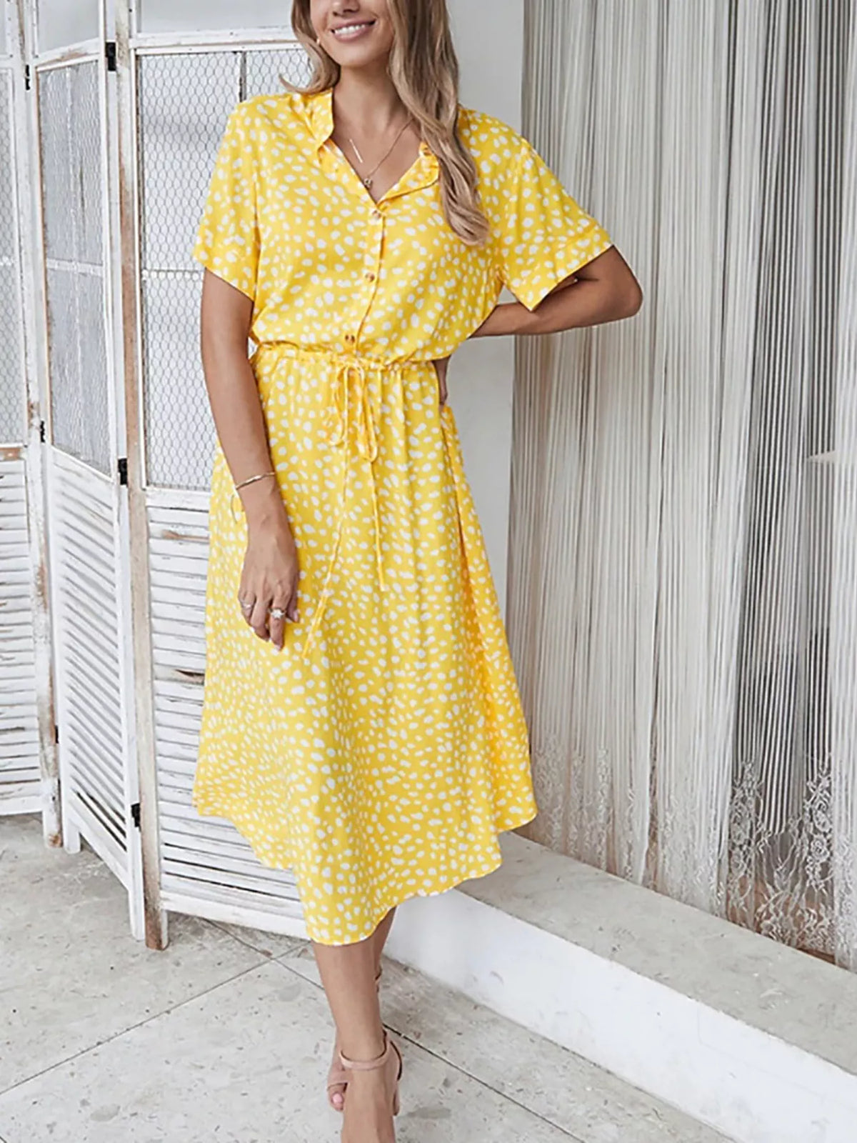 Polka dot button front midi dress side view