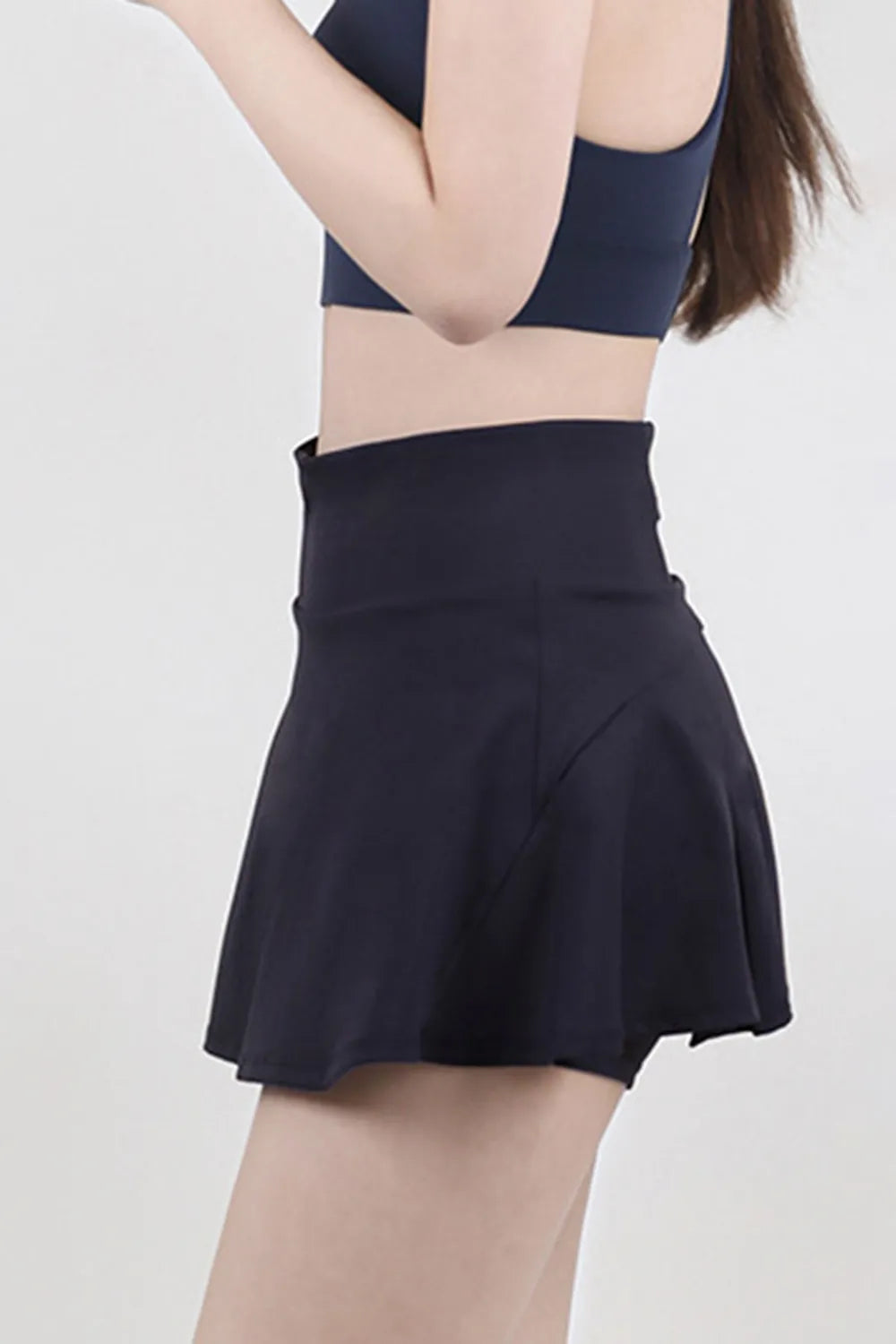 High waist pleated active skirt angled view