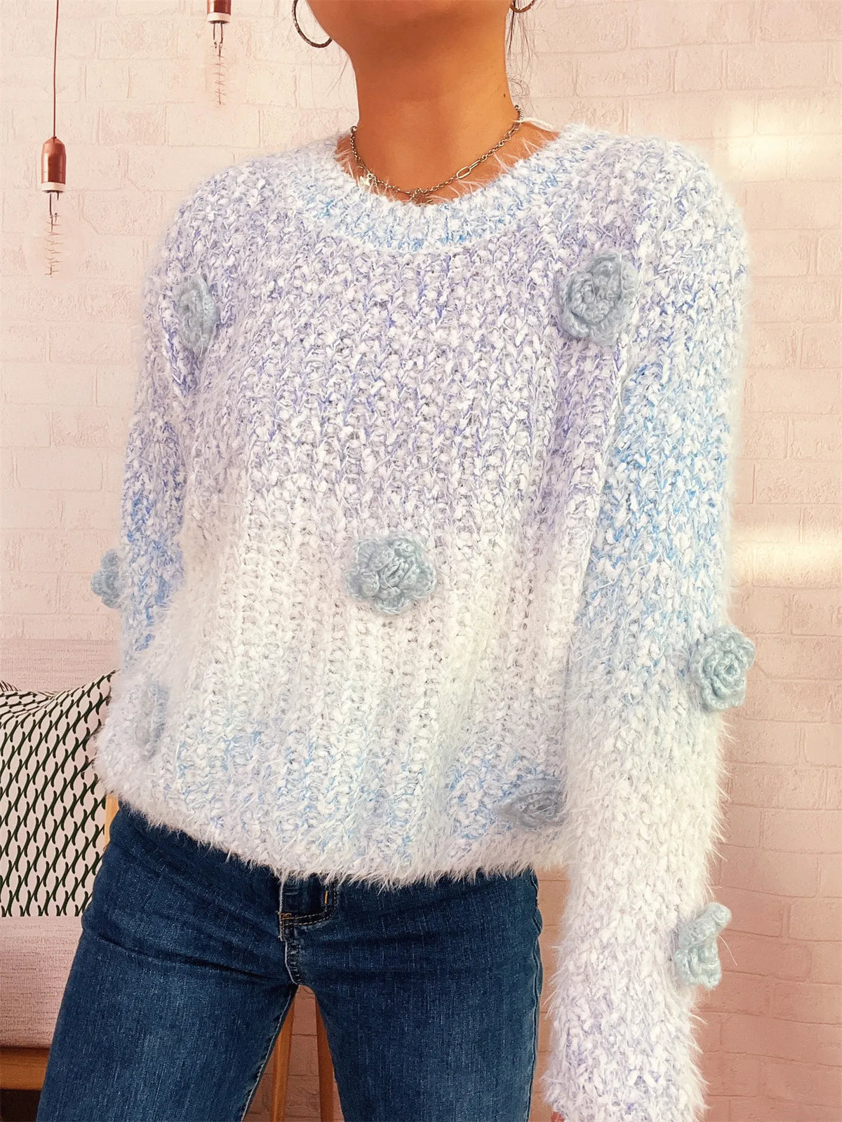 Flower embellished round neck sweater, shoulder detail