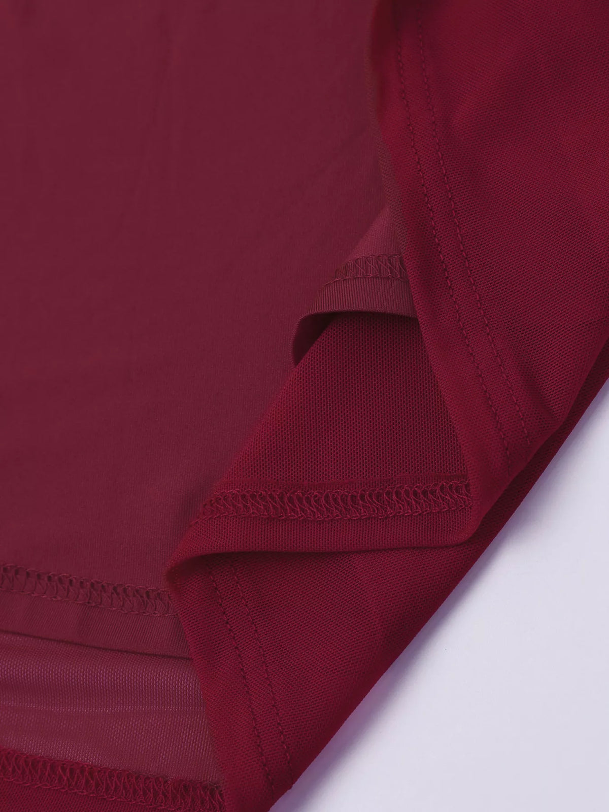 Halter neck ruched slit maxi dress close up of the neckline