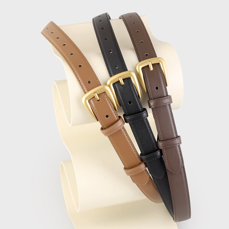 Skinny leather belt with golden buckle front view