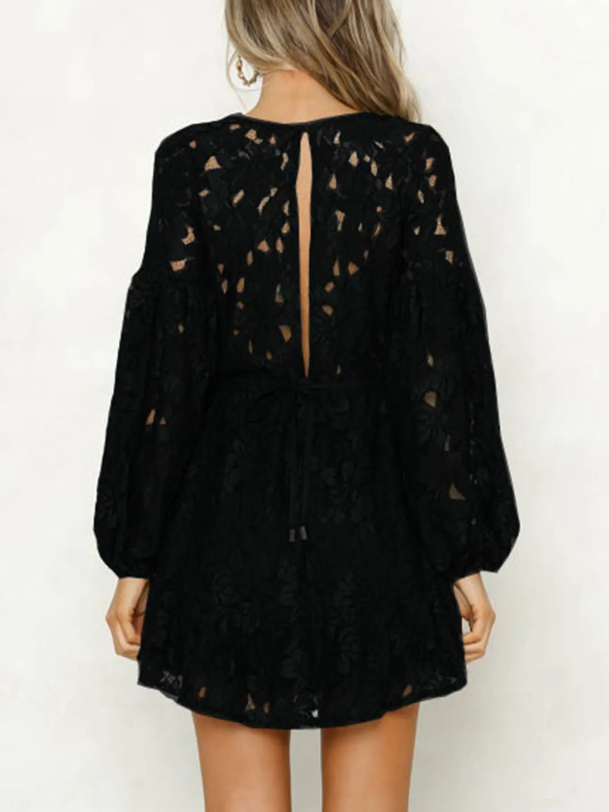Long sleeve lace mini dress movement shot