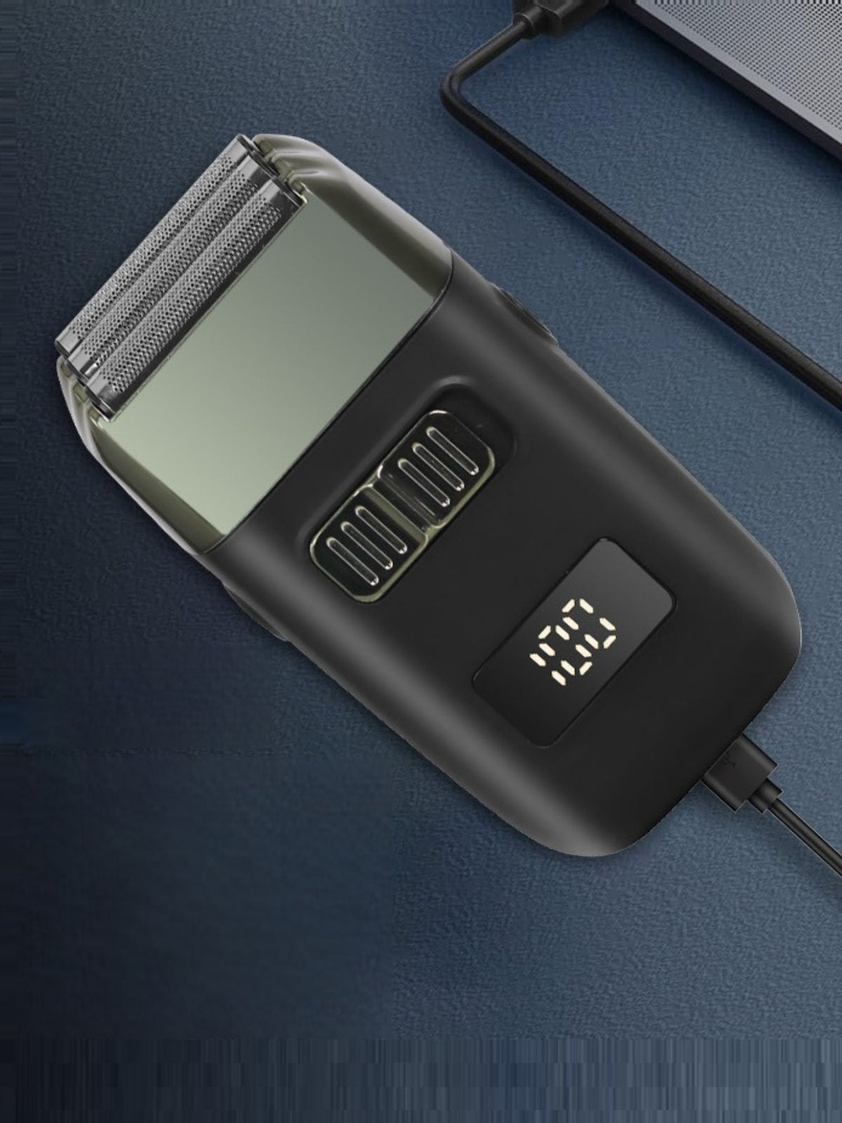 Compact mini electric shaver packaged view