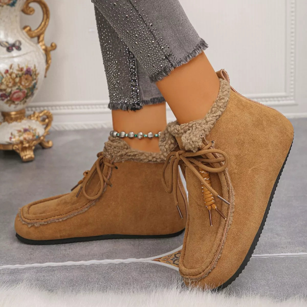 Plush lined ankle boots sole and tread detail