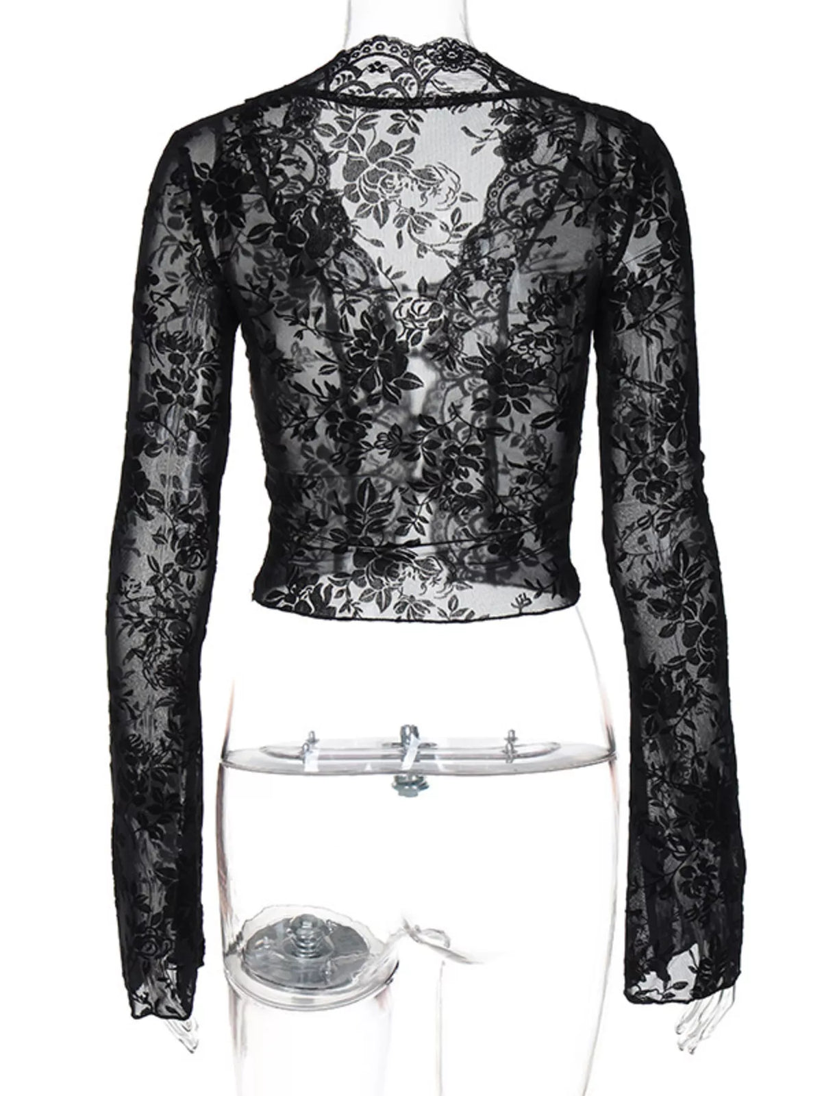 Angled view of the black lace top showing the sheer body