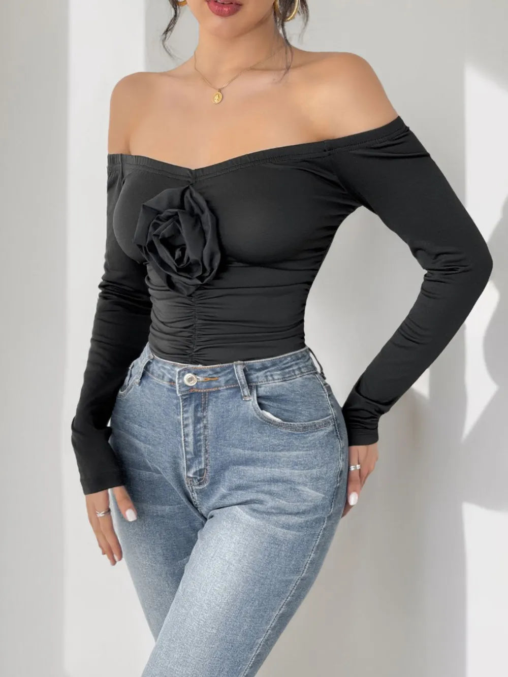 Perfee Ruched Flower Off-Shoulder Long Sleeve Bodysuit - Fashorio