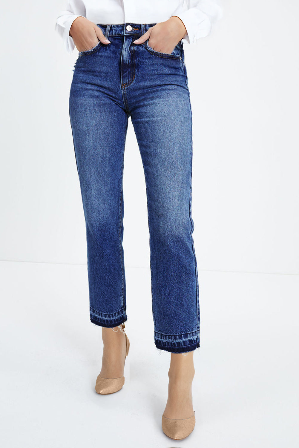 Whiskered wash denim raw hem detail