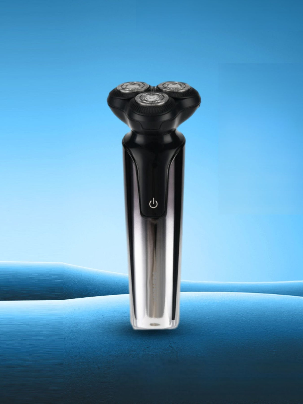 Shaver being rinsed under water