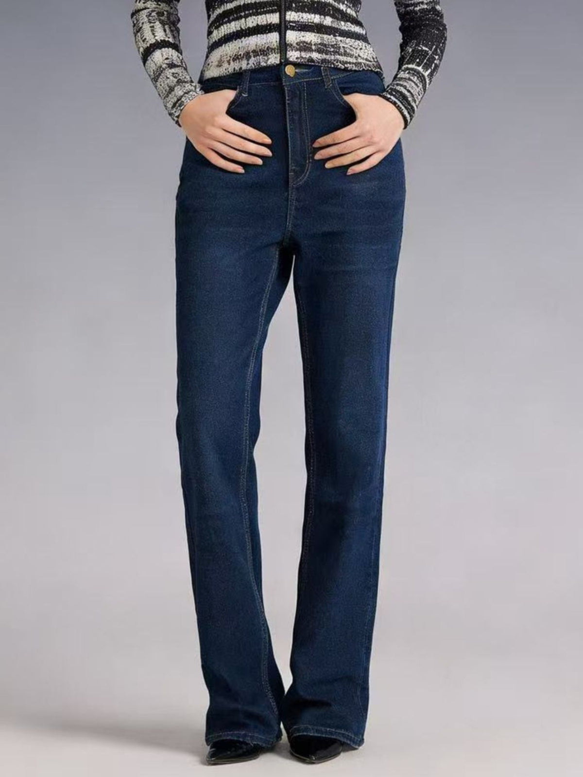 Side view of blue bootcut jeans