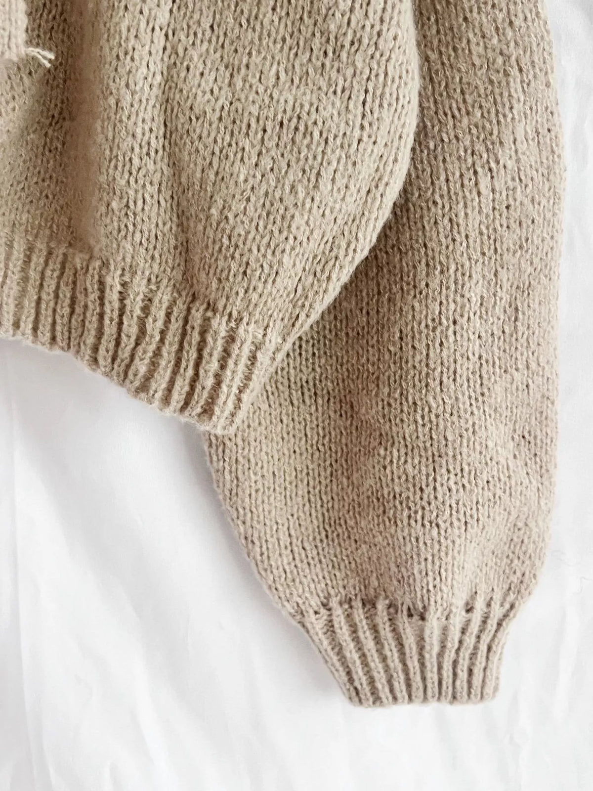 Chunky knit cardigan styled with jeans