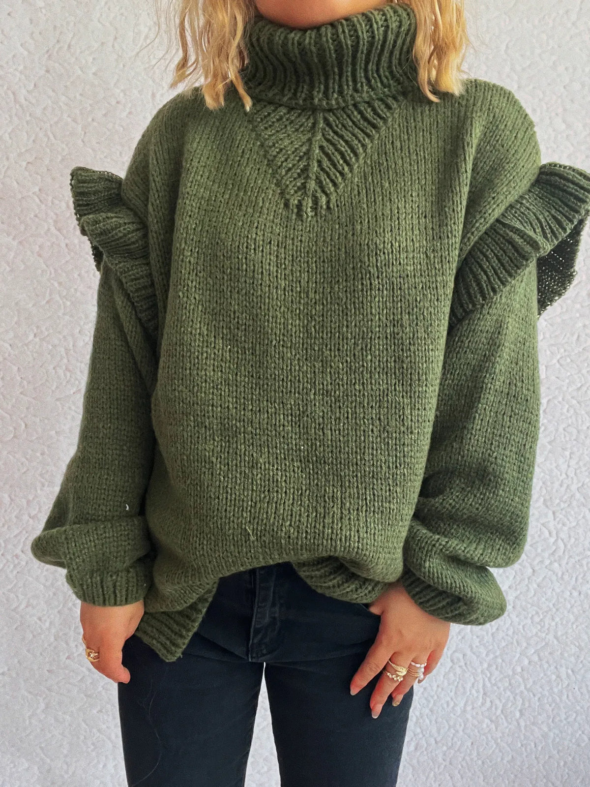 Ruffled turtleneck long sleeve sweater on model