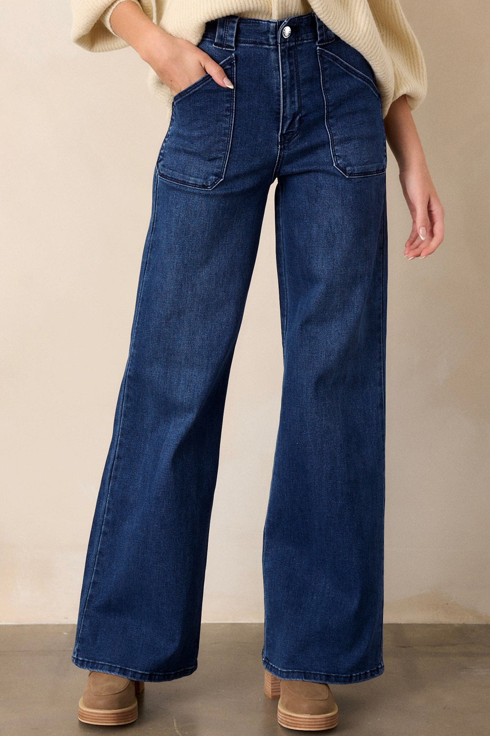Navy straight leg jeans on model full length