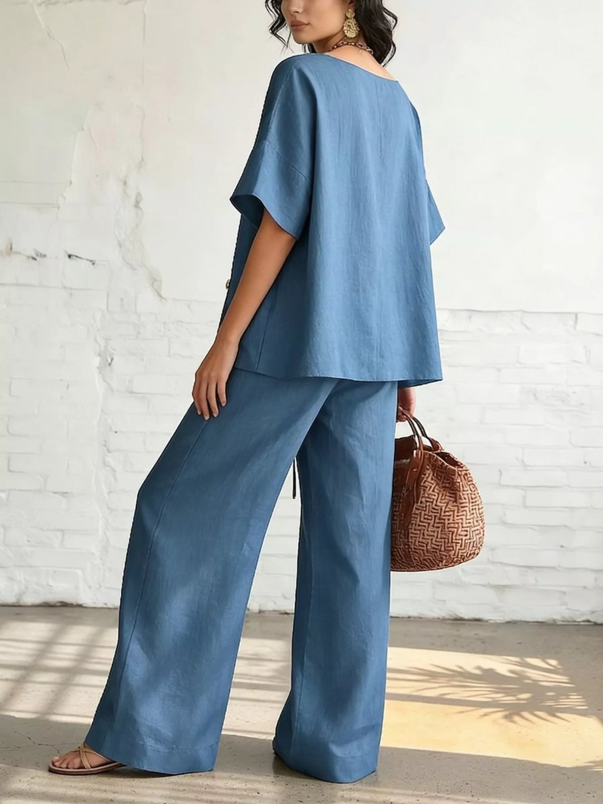 Side view of the matching set showing the wide leg pants